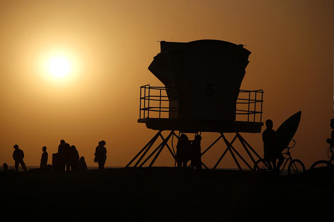 Folks appreciating sunset at Ocean Beach